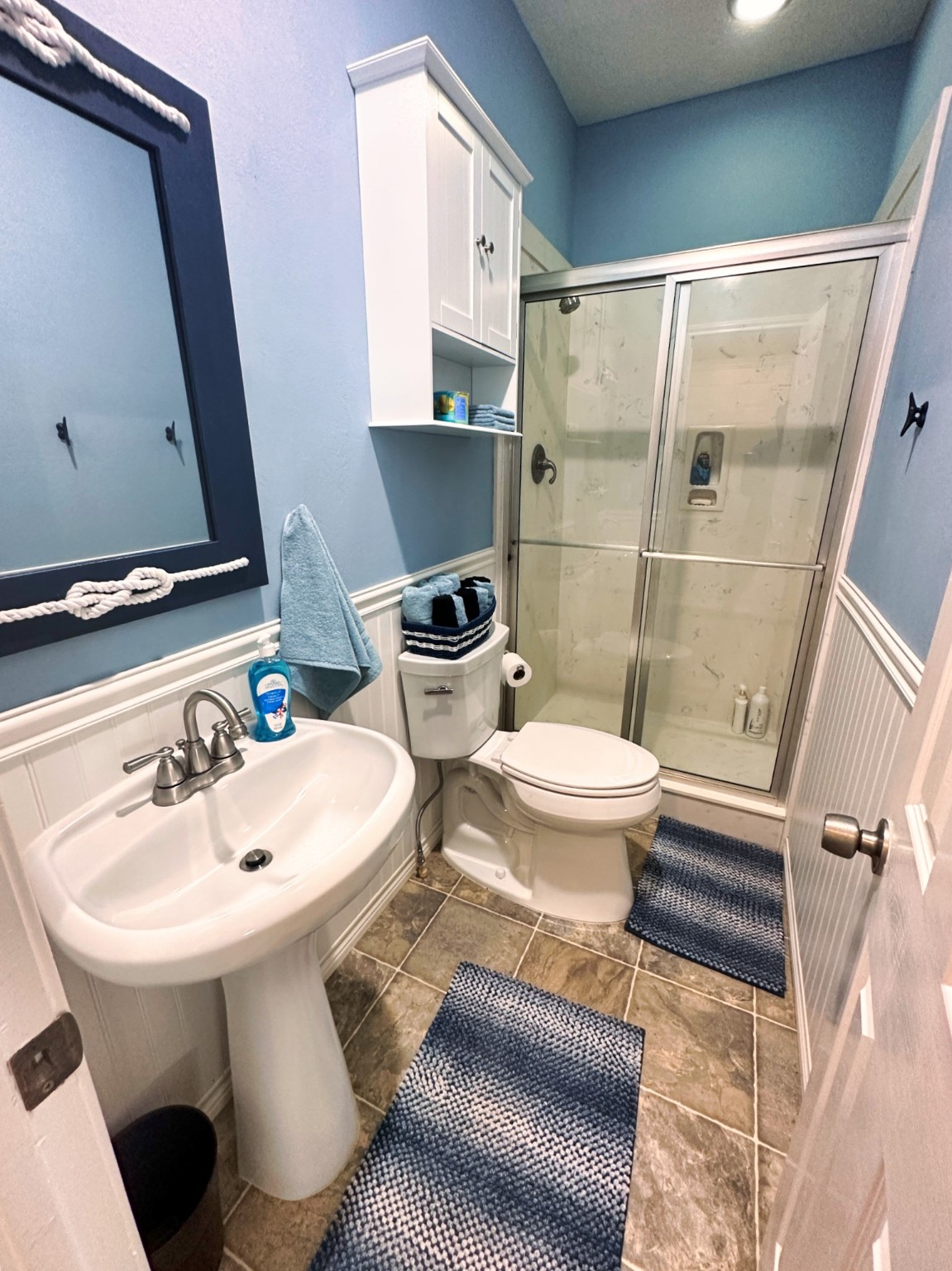 1867 County Road 291 Sargent, TX 77414 - Photo 21 of 38 a bathroom with a sink a toilet and shower