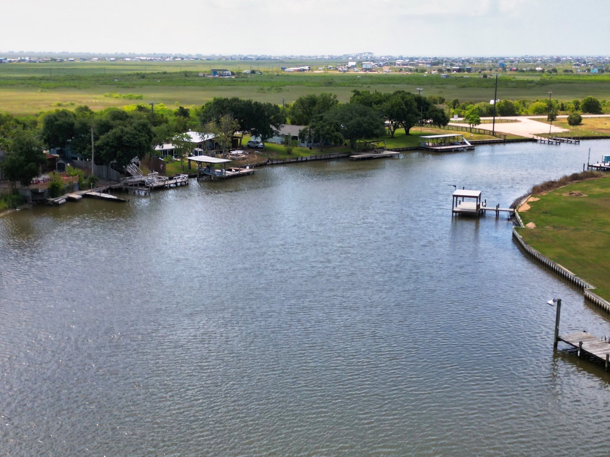 1867 County Road 291 Sargent, TX 77414 - Photo 33 of 38 a view of a lake with a city