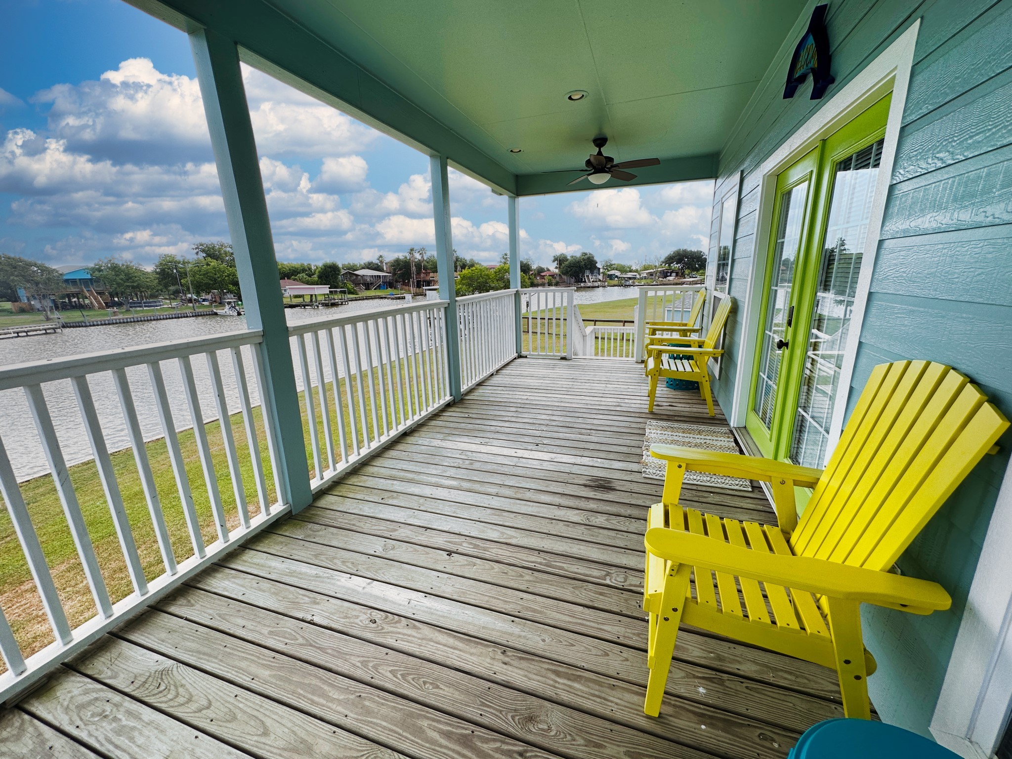 1867 County Road 291 Sargent, TX 77414 - Photo 7 of 38 a view of a porch with wooden floor