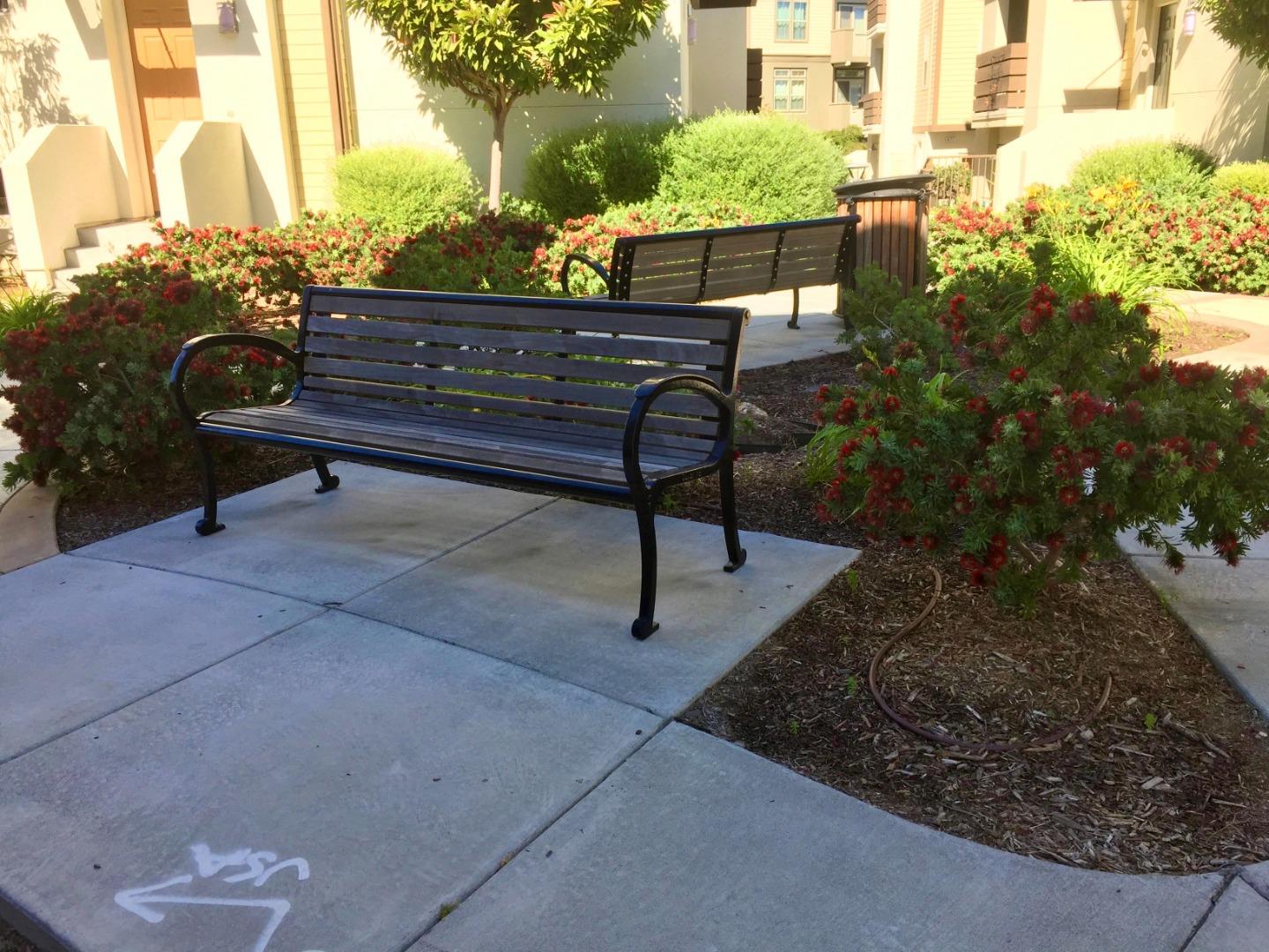 458 Landeros Drive San Mateo, CA 94403 - Photo 21 of 42 a view of a bench in a backyard