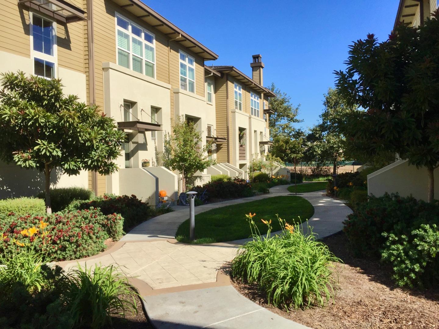 458 Landeros Drive San Mateo, CA 94403 - Photo 3 of 42 a front view of a house with garden and patio