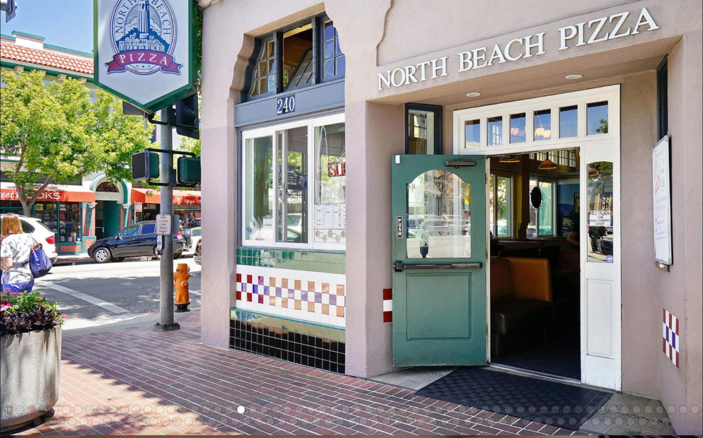 458 Landeros Drive San Mateo, CA 94403 - Photo 40 of 42 a front view of a building with a glass door and shower