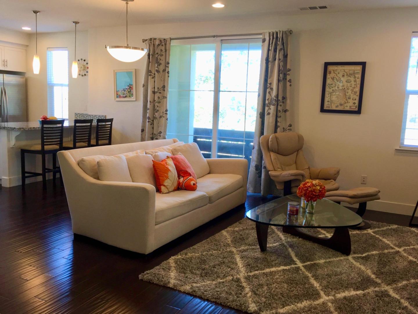 458 Landeros Drive San Mateo, CA 94403 - Photo 6 of 42 a living room with furniture and wooden floor