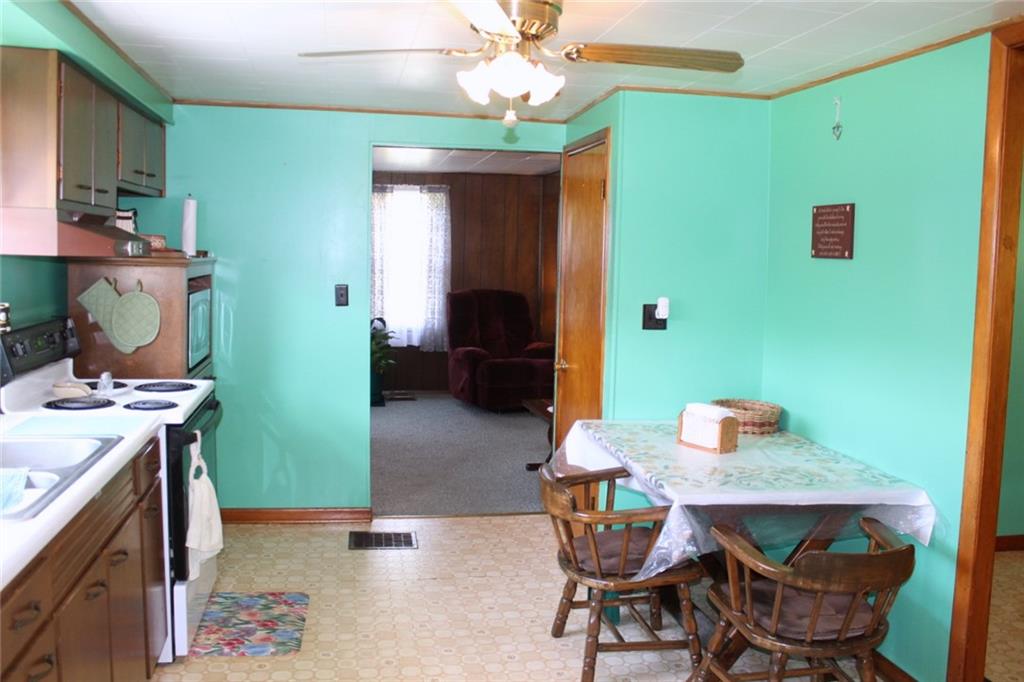 640 Cherry Road Chicora, PA 16025 - Photo 12 of 24 a workspace with furniture and wooden floor