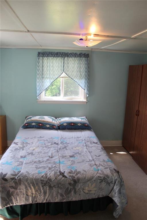 640 Cherry Road Chicora, PA 16025 - Photo 16 of 24 a bedroom with a bed and a window