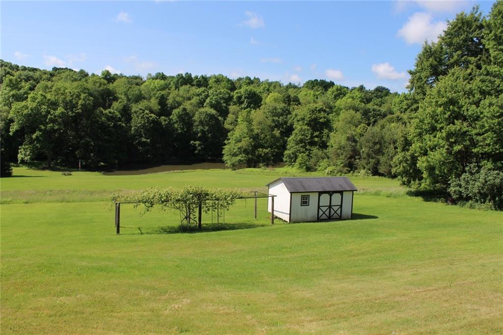 640 Cherry Road Chicora, PA 16025 - Photo 3 of 24 a view of a house with a yard