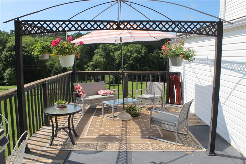 640 Cherry Road Chicora, PA 16025 - Photo 4 of 24 a view of a chairs and table in the balcony