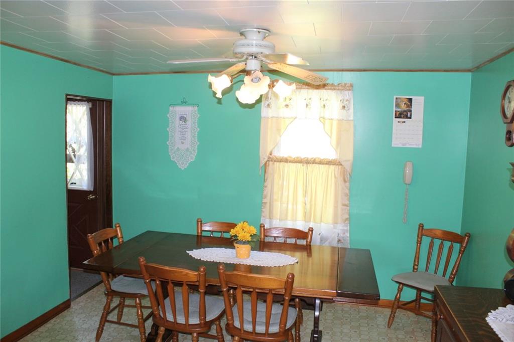 640 Cherry Road Chicora, PA 16025 - Photo 5 of 24 a view of a dining room with furniture and window