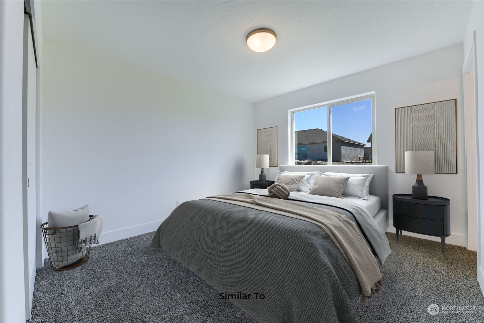 209 North Sandy Loop Moses Lake, WA 98837 - Photo 13 of 19 a bedroom with a bed and a view of bathroom
