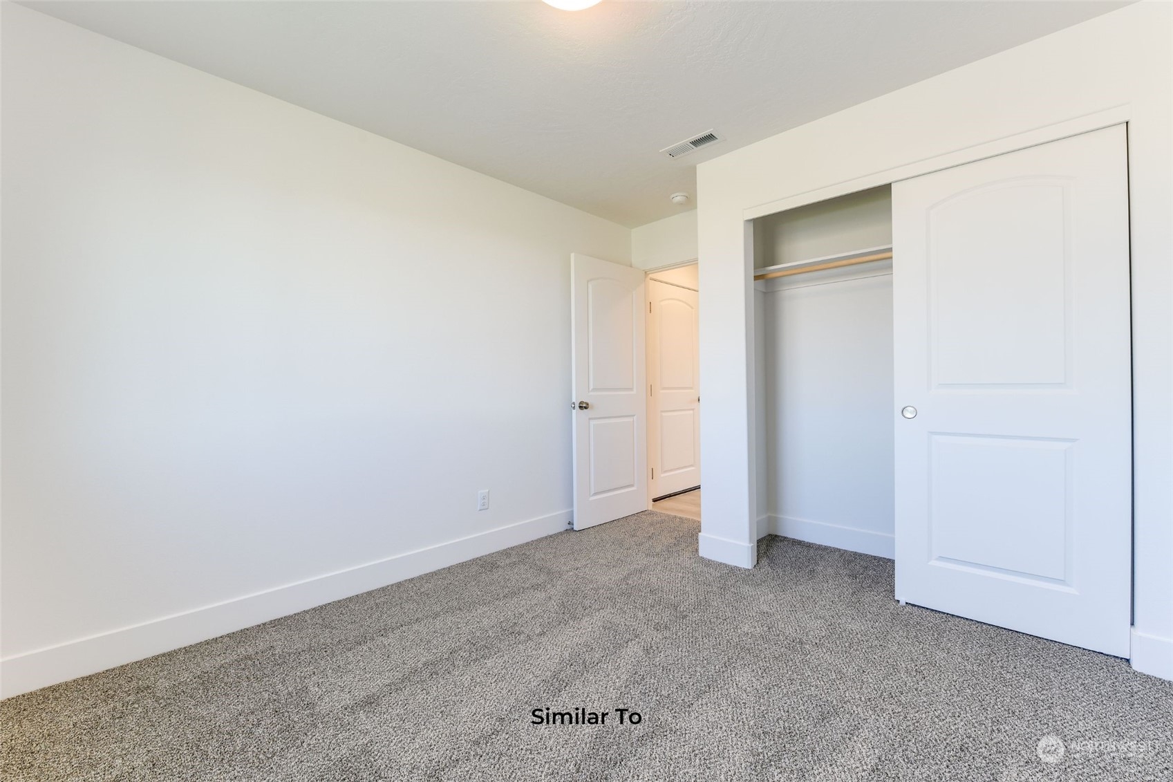 209 North Sandy Loop Moses Lake, WA 98837 - Photo 9 of 19 an empty room with closet