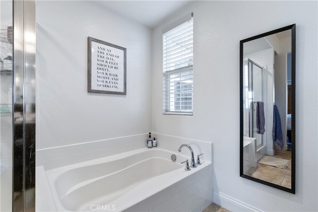 9354 Riberena Circle Atascadero, CA 93422 - Photo 38 of 47 a white bath tub sitting next to a bathroom sink