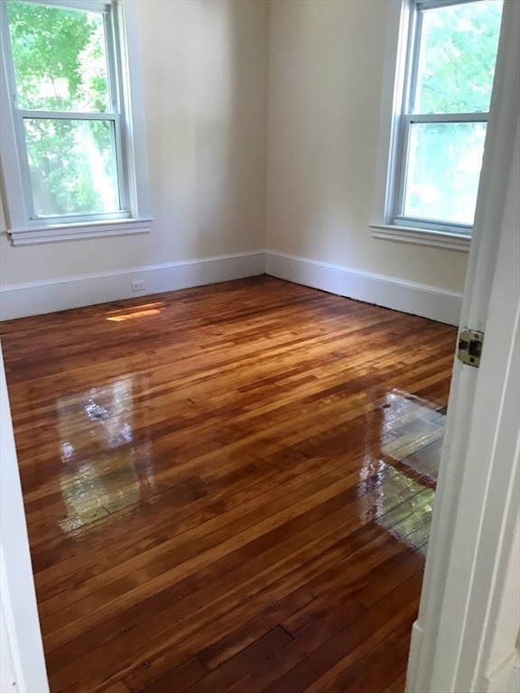 28 Beaconsfield Road, Unit 1 Brookline, MA 02445 - Photo 14 of 21 a view of empty room with window