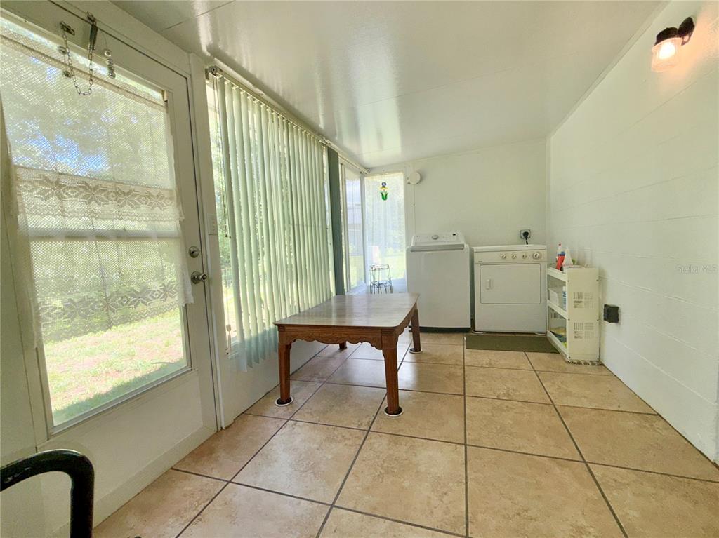 11911 Bayonet Lane New Port Richey, FL 34654 - Photo 10 of 26 a view of an empty room with a window