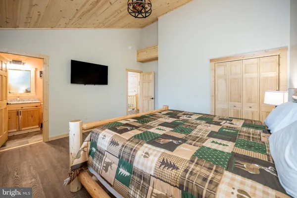 a view of a livingroom with wooden floor