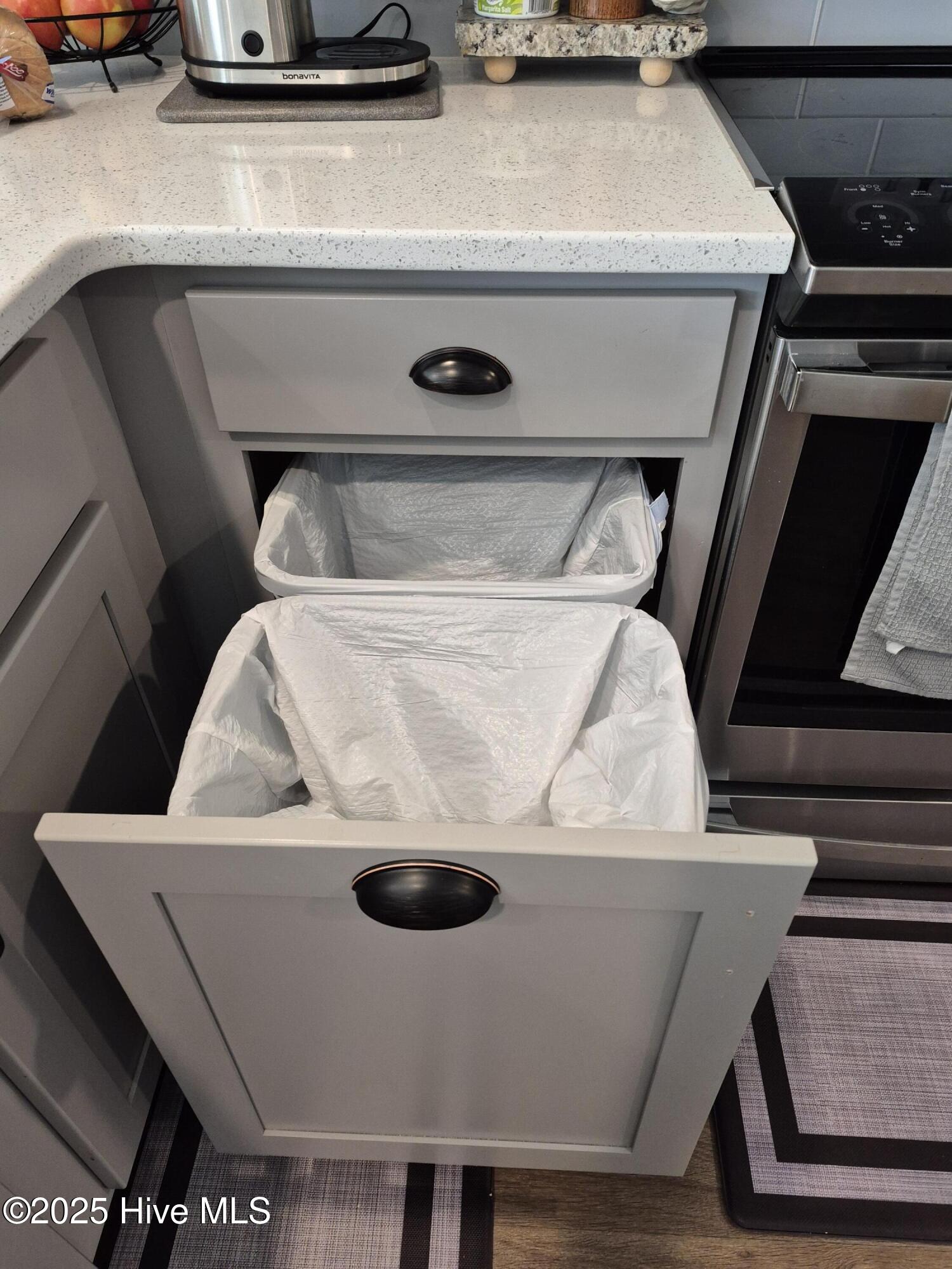 776 Buckeye Road Northeast Leland, NC 28451 - Photo 16 of 42 Pull Out Drawer for Garbage and Recycling