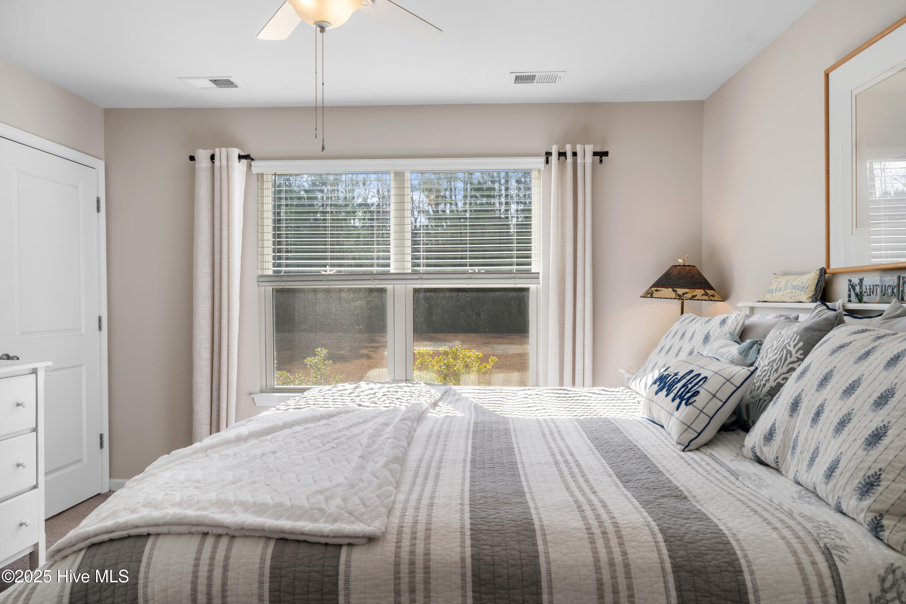 776 Buckeye Road Northeast Leland, NC 28451 - Photo 32 of 42 Owners Suite with Views of the spacious back yard