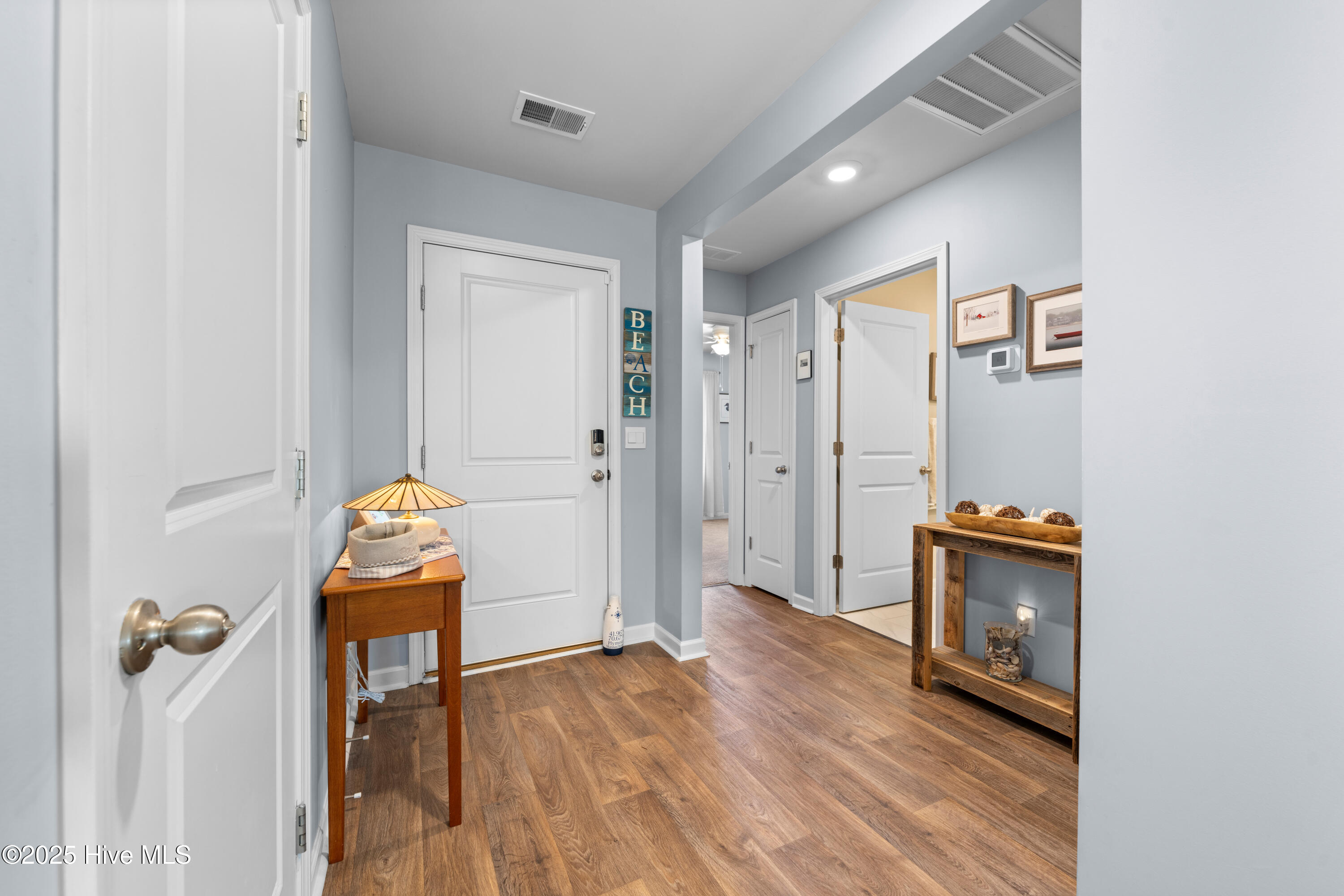 776 Buckeye Road Northeast Leland, NC 28451 - Photo 34 of 42 Foyer and Entrance to Guest Bedrooms