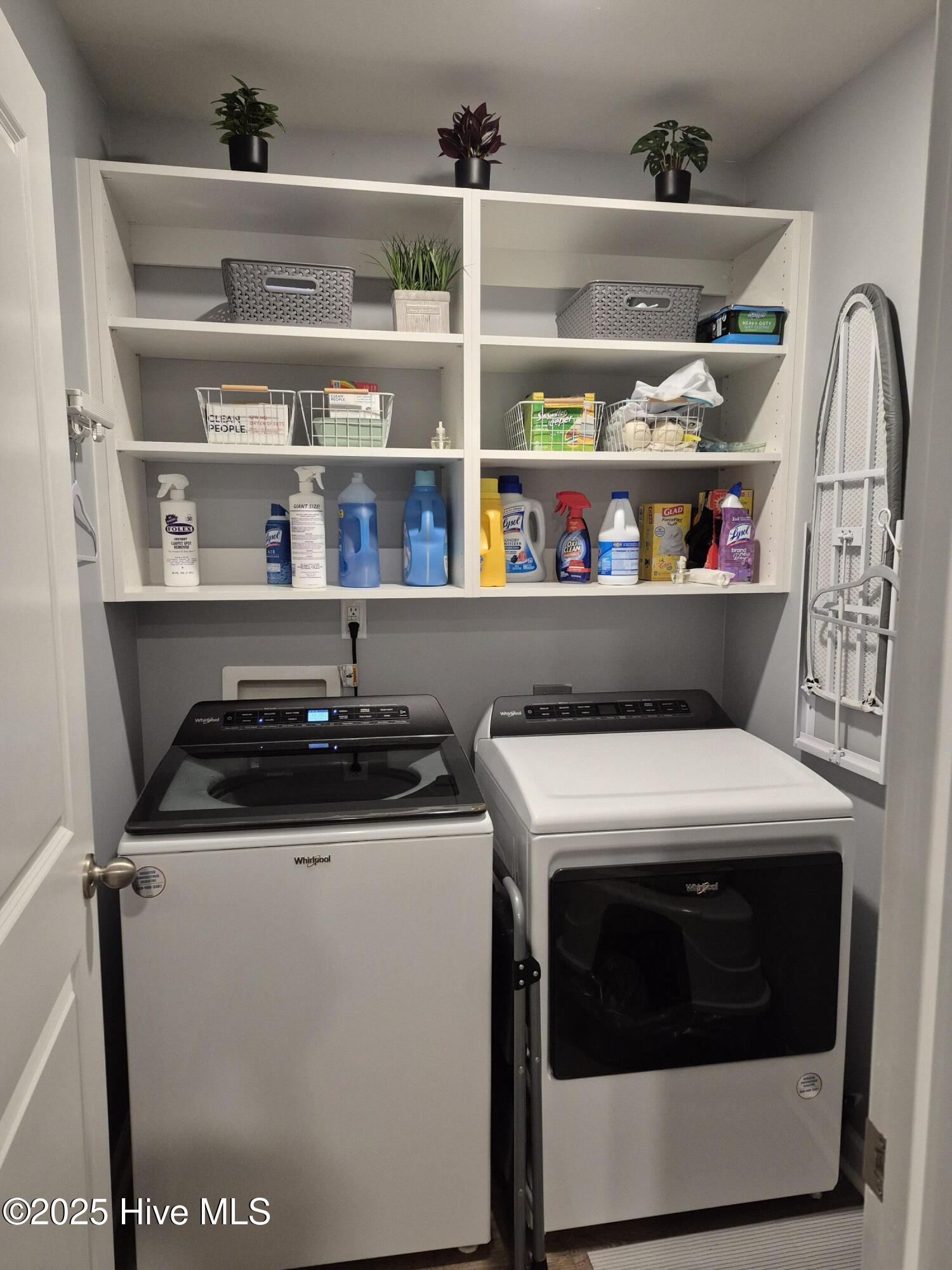 776 Buckeye Road Northeast Leland, NC 28451 - Photo 40 of 42 Shelving has been Professionally installed in the Laundry Room for Additional Storage