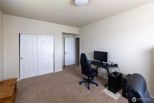 a room with furniture and a window