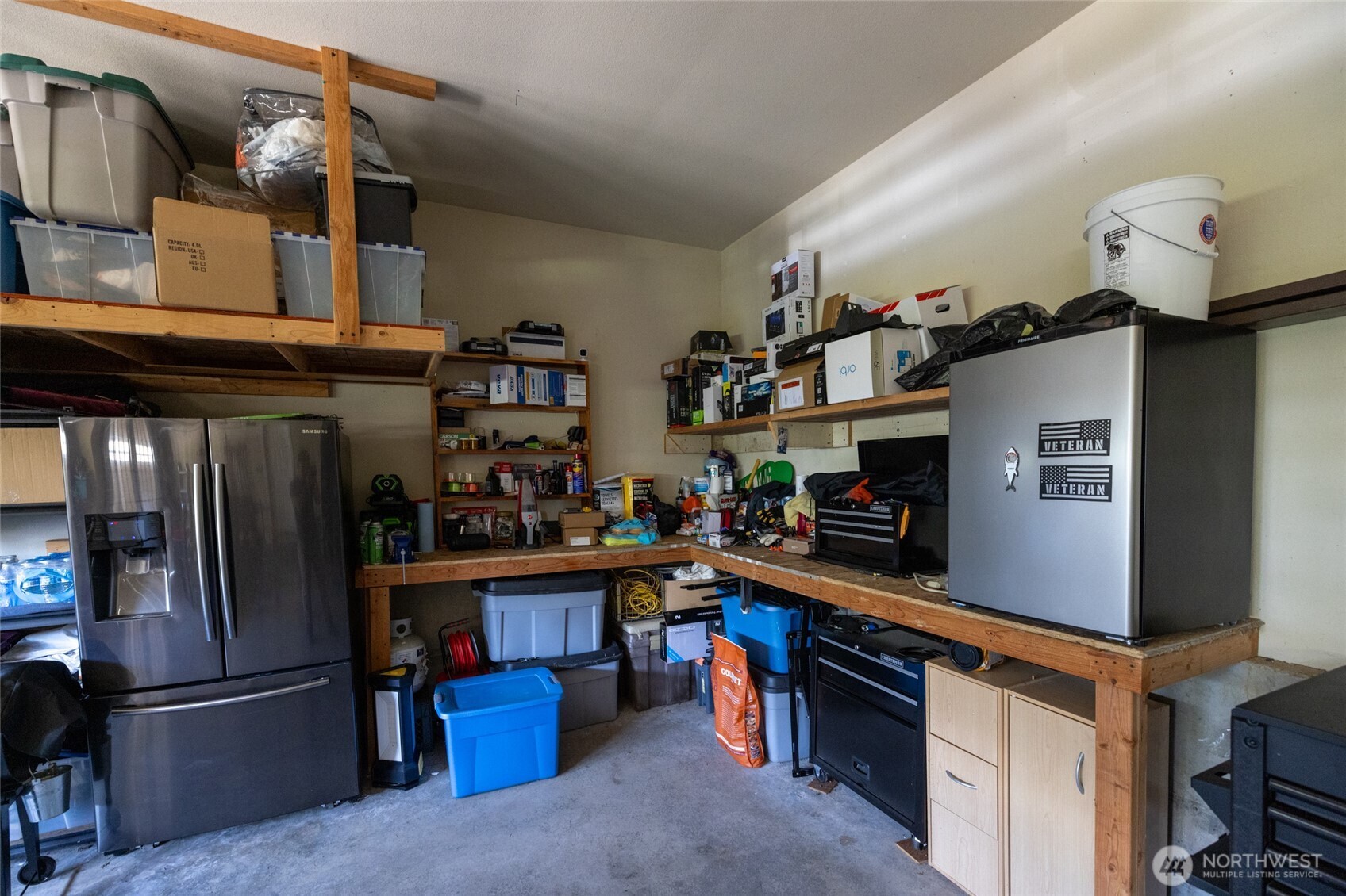 1895 Southeast Maple Drive Chehalis, WA 98532 - Photo 33 of 35 a kitchen with stainless steel appliances granite countertop a refrigerator and a stove top oven