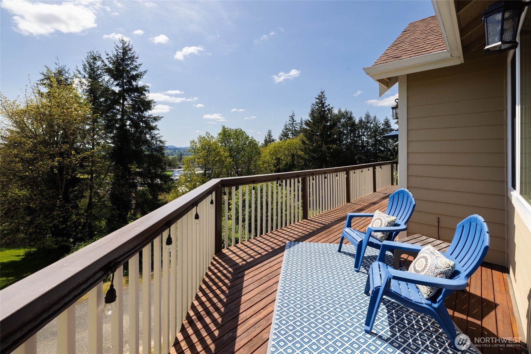 1895 Southeast Maple Drive Chehalis, WA 98532 - Photo 5 of 35 a view of a chair and table in the balcony