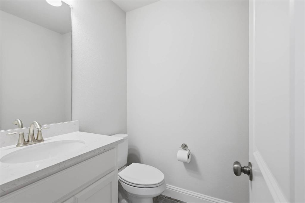 1053 Sarah Street Allen, TX 75013 - Photo 29 of 30 half bathroom off of game room