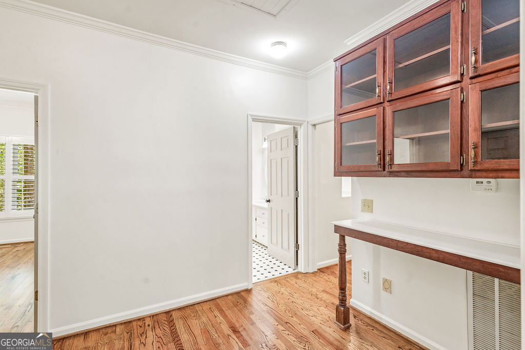 230 Haynes Road Moreland, GA 30259 - Photo 17 of 38 a view of a kitchen cabinets and wooden floor