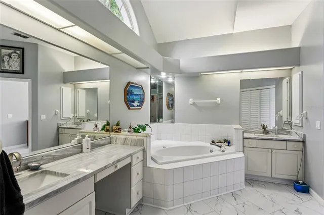 a bedroom with bed and a window