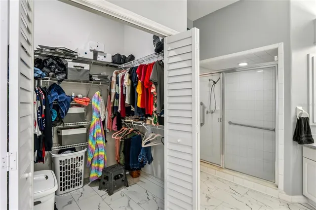 a view of a swimming pool with a porch