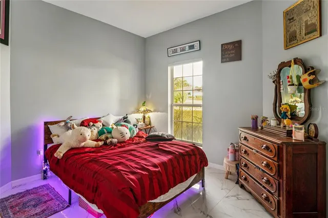 a view of a swimming pool with a yard