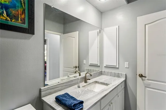 a view of house with yard and entertaining space