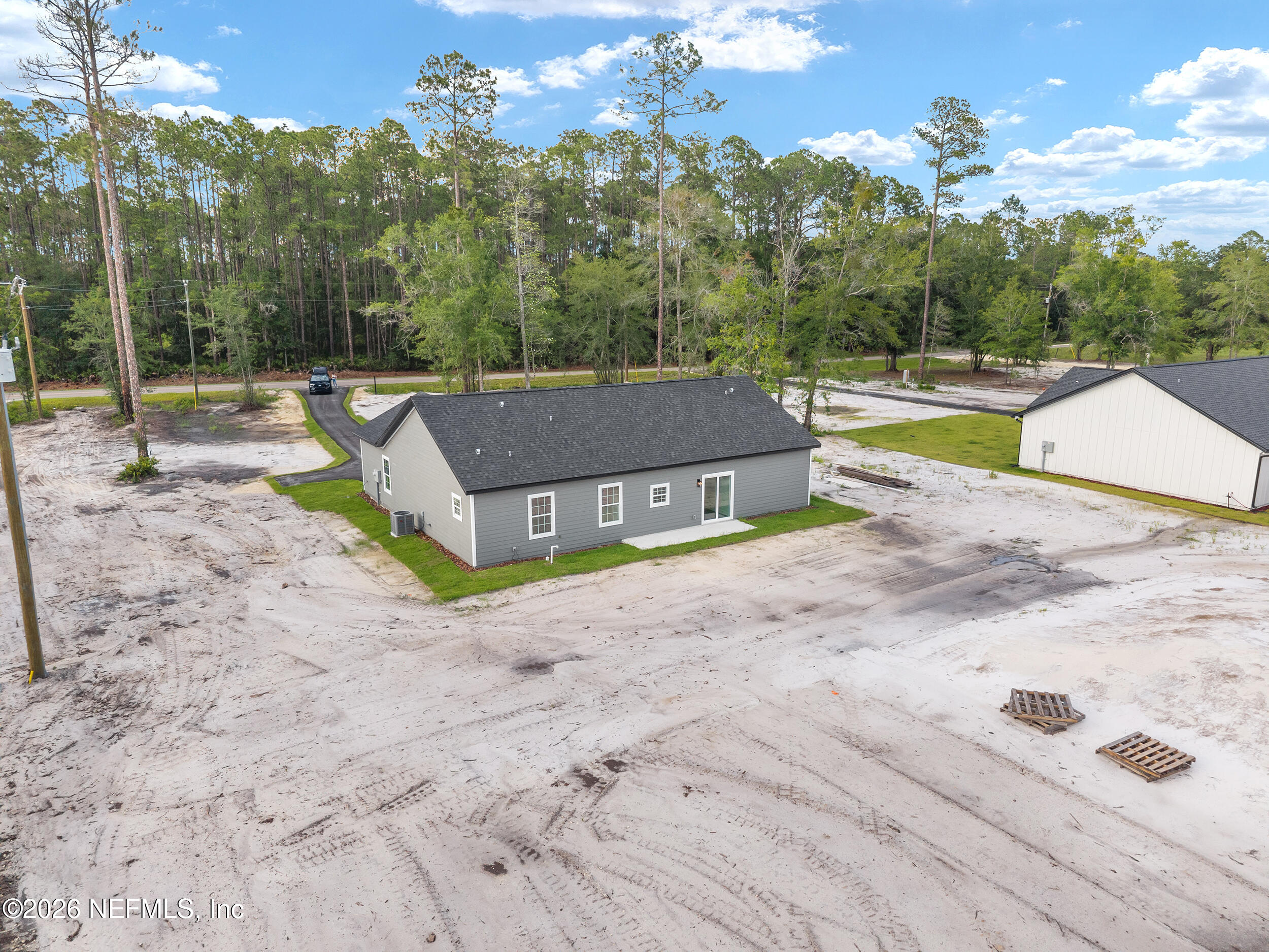 9284 Southwest Sw Cr Hampton, FL 32044 - Photo 40 of 48 DJI_20260625184349_0346_D