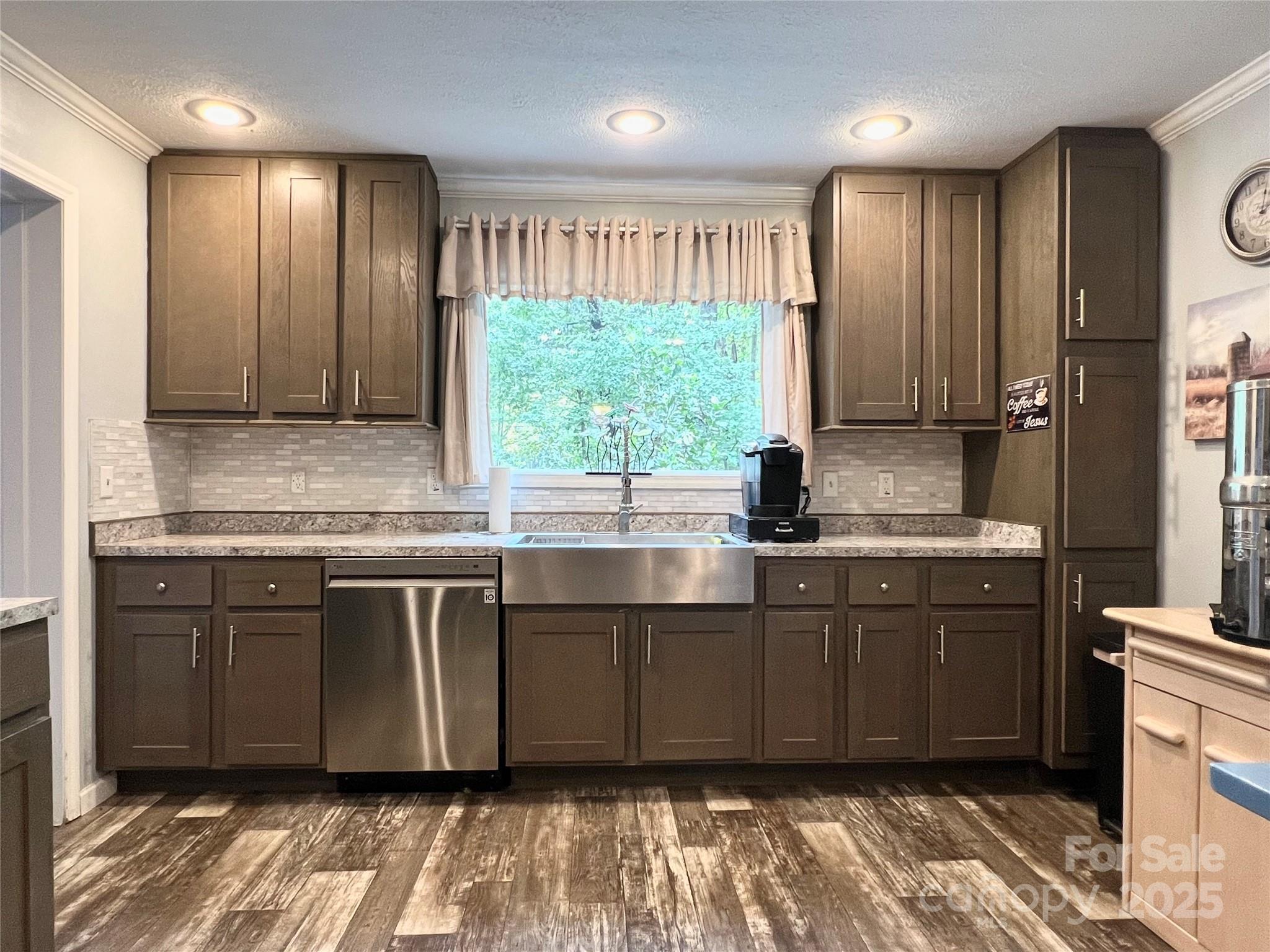 1258 Willis Road Chester, SC 29706 - Photo 1 of 32 a kitchen with a sink window and cabinets