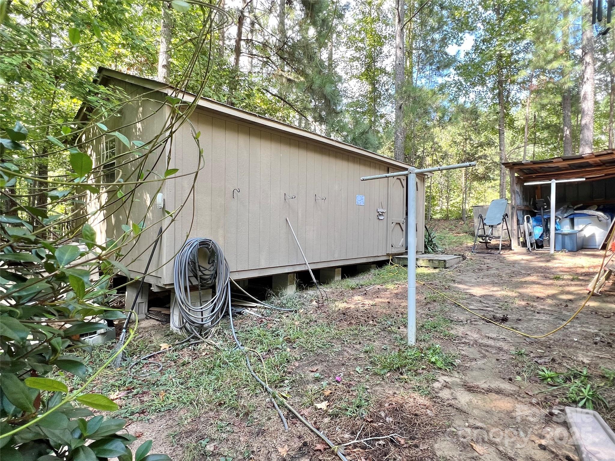 1258 Willis Road Chester, SC 29706 - Photo 30 of 32 a backyard of a house with barbeque oven