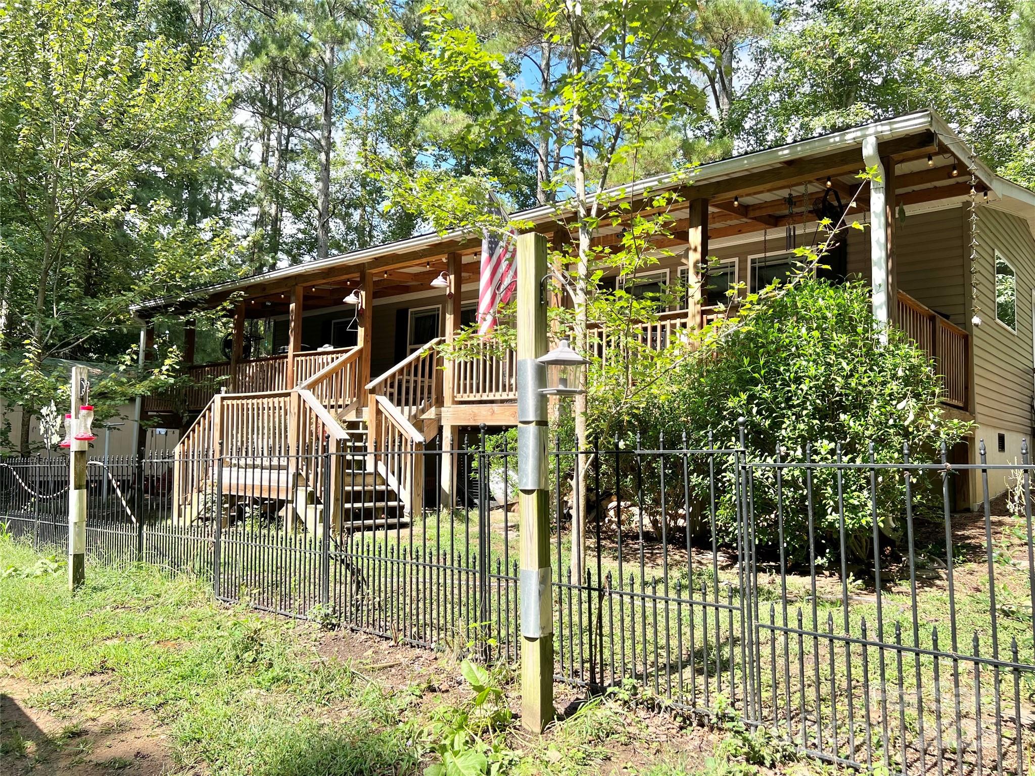 1258 Willis Road Chester, SC 29706 - Photo 31 of 32 a front view of a house with a garden