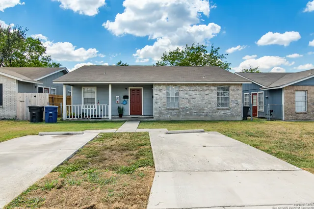 a view of outdoor space yard and front view of a house