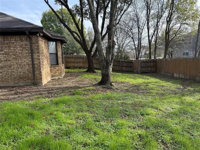 a fire hydrant in the middle of a field