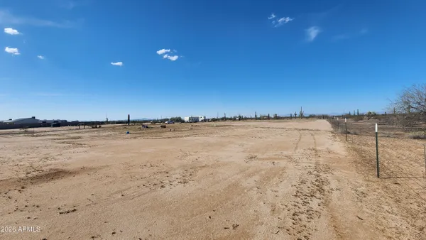 a view of a lake and a yard
