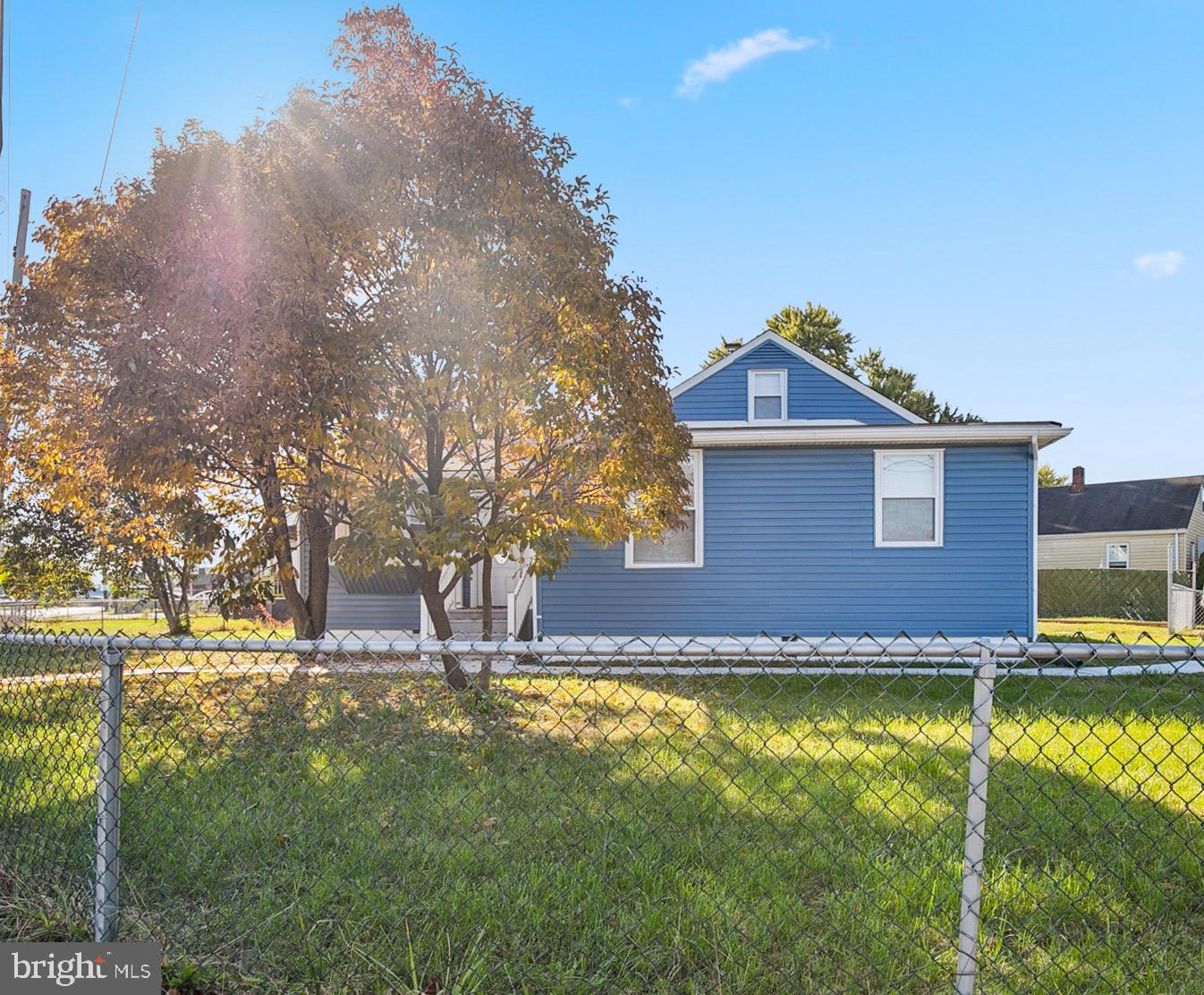 2501 North Point Road Dundalk, MD 21222 - Photo 2 of 28 a view of swimming pool with lawn chairs and plants