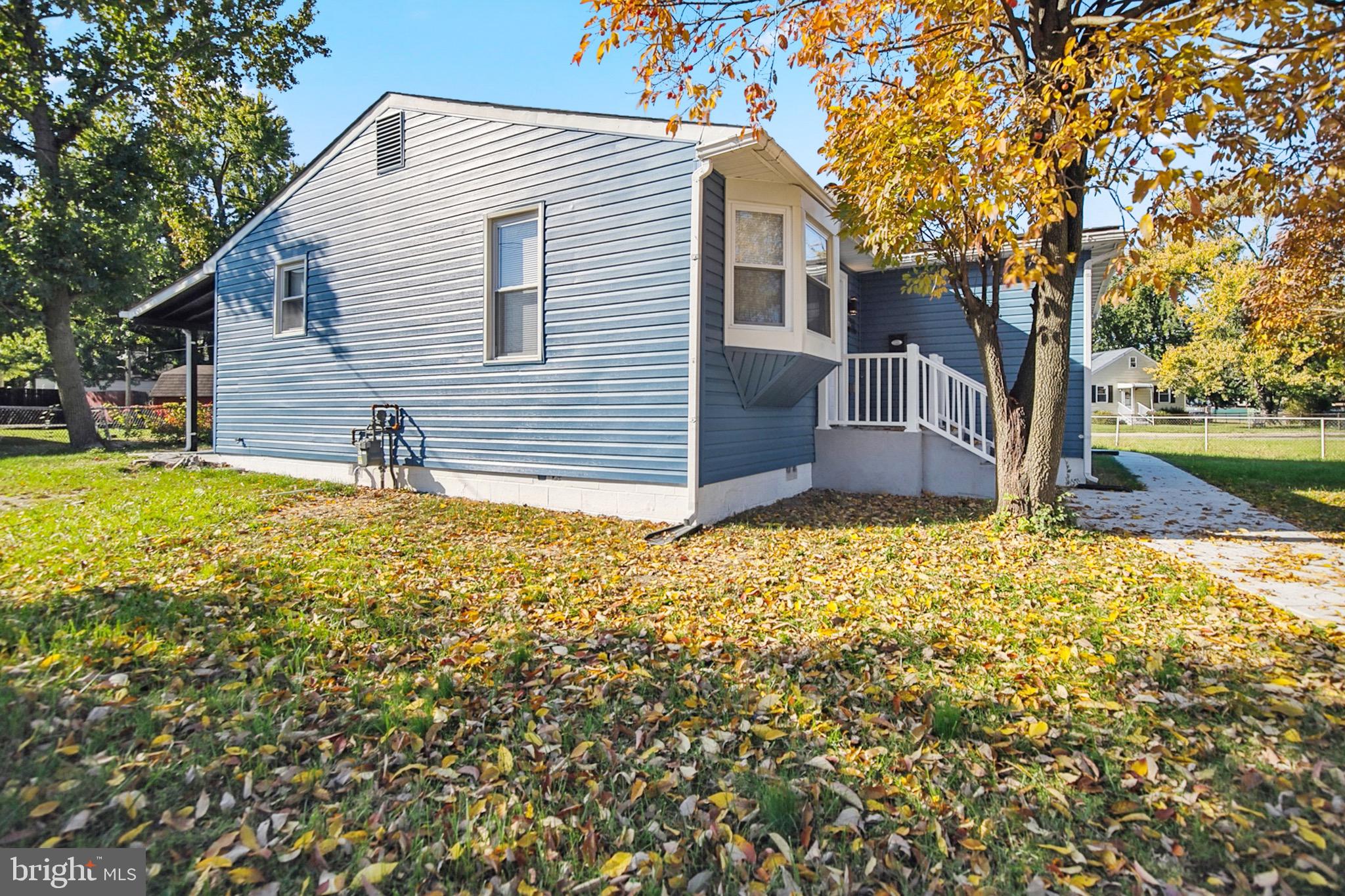 2501 North Point Road Dundalk, MD 21222 - Photo 4 of 28 a backyard of a house with table and chairs