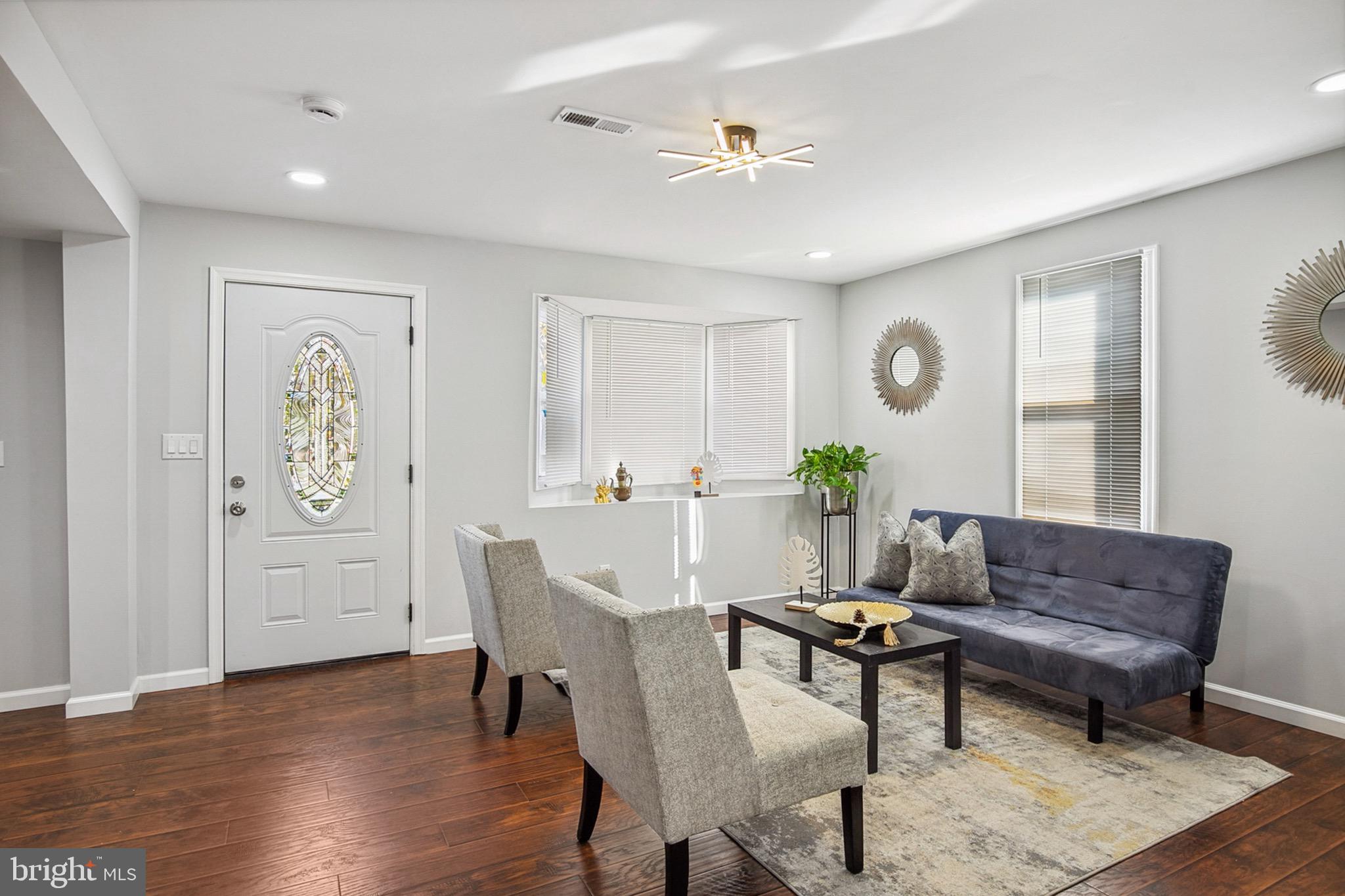 2501 North Point Road Dundalk, MD 21222 - Photo 6 of 28 a living room with furniture and wooden floor