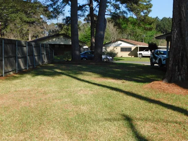 a view of a house with swimming pool