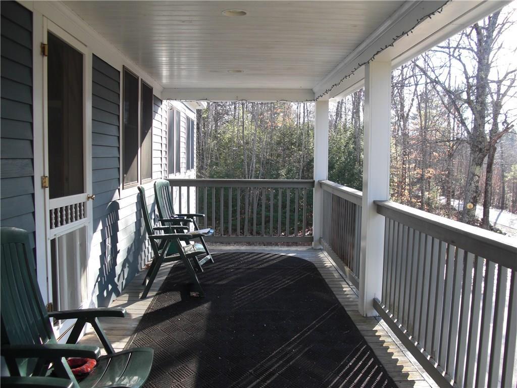 263 Porterfield Road Porter, ME 04068 - Photo 2 of 31 Front deck, 8 ft. wide with...