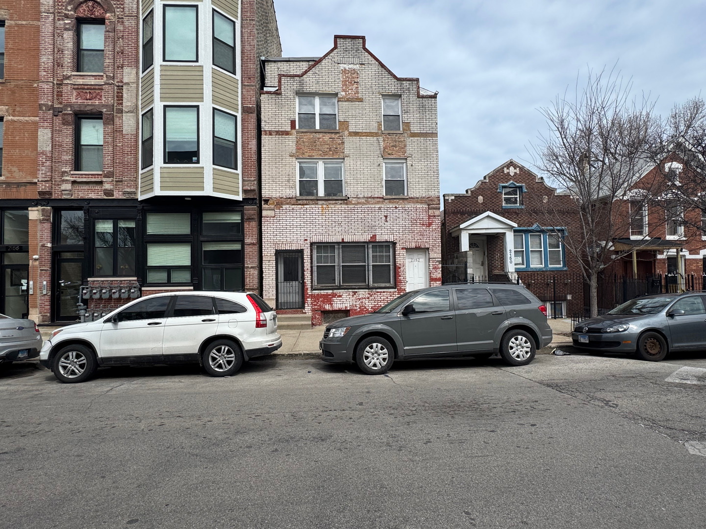 a car parked in front of a house
