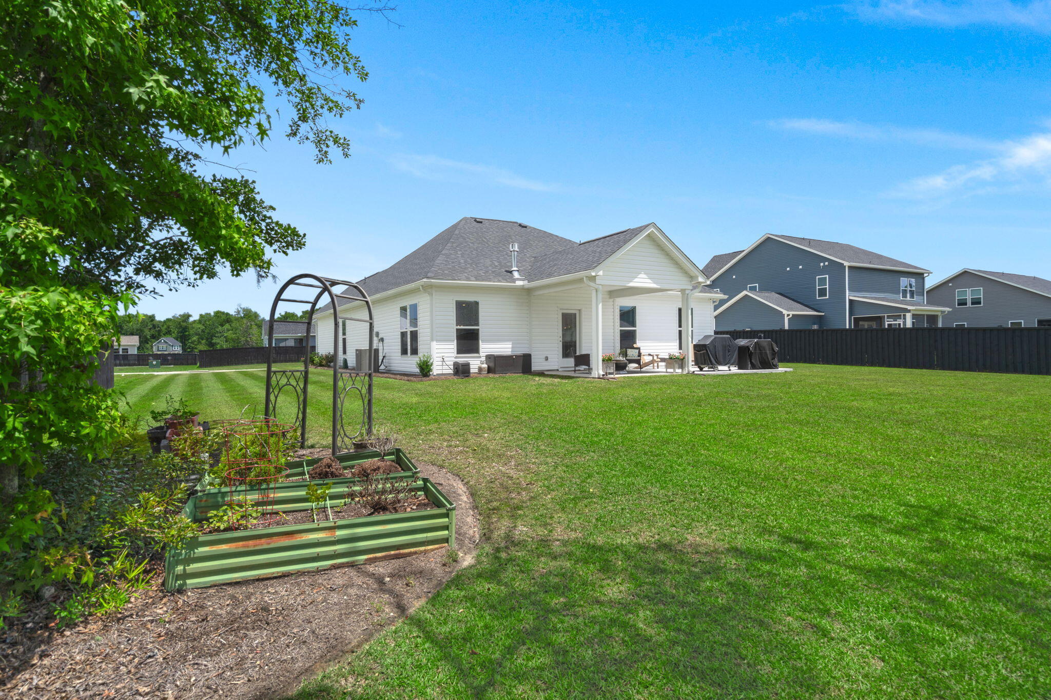 179 Darby Mdw Lane Ridgeville, SC 29472 - Photo 33 of 38 Corner view of the huge yard