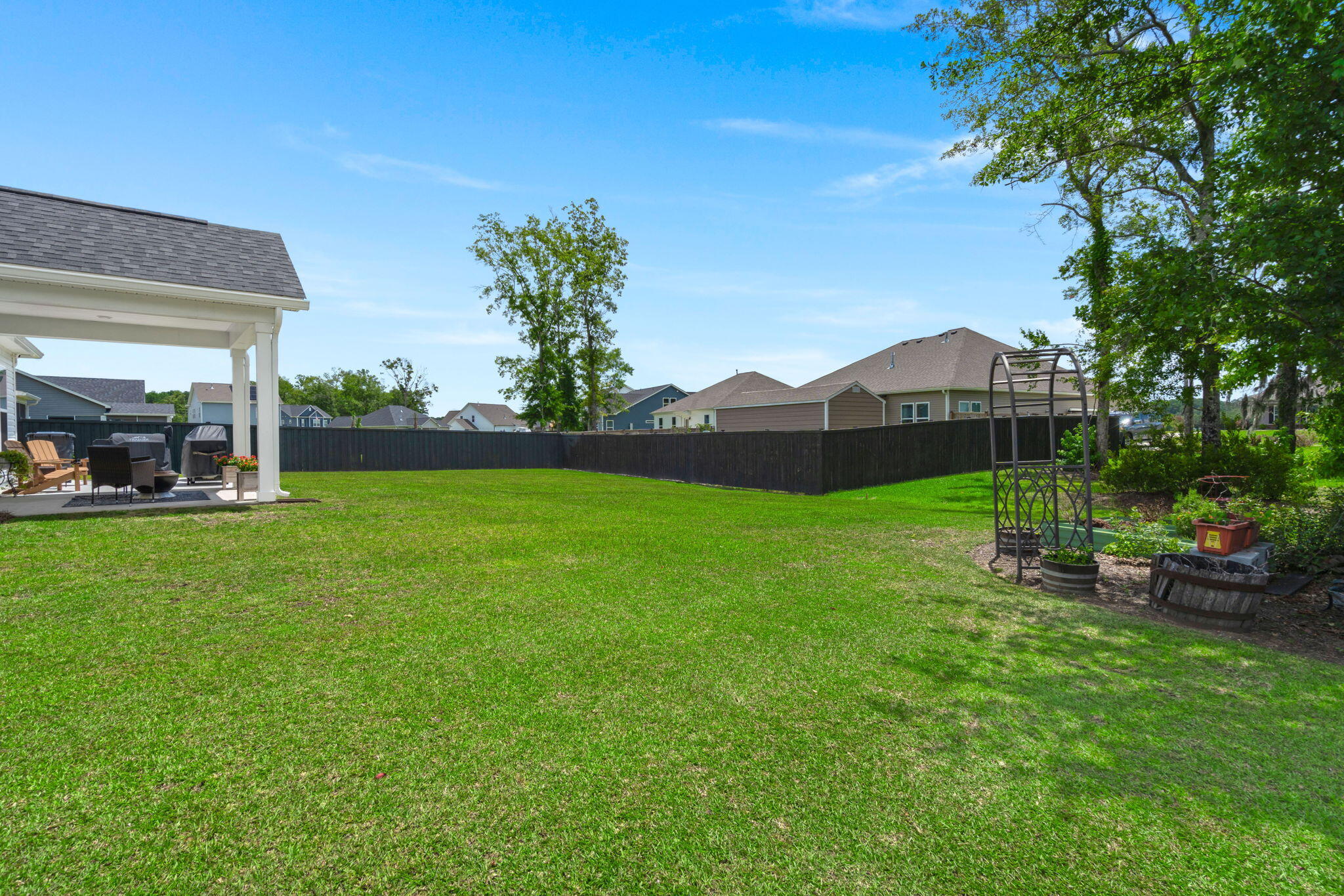179 Darby Mdw Lane Ridgeville, SC 29472 - Photo 34 of 38 Look at the luch green grass!