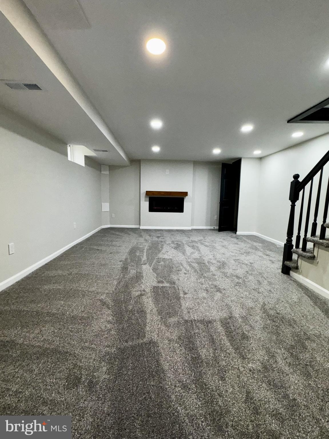 1912 Barry Road Dundalk, MD 21222 - Photo 16 of 23 an empty room with windows and entertaining space