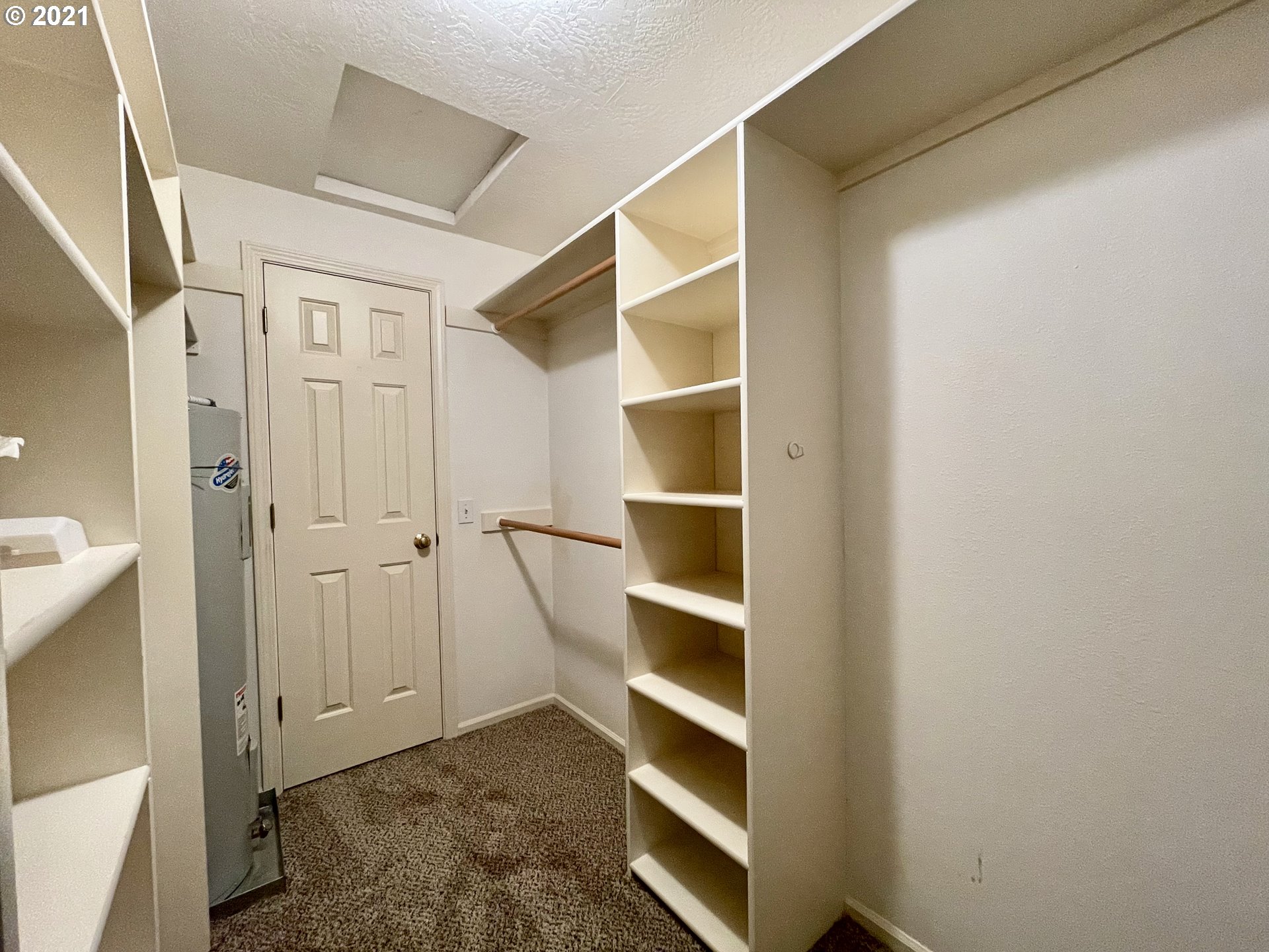 994 West L Street Springfield, OR 97477 - Photo 17 of 26 a view of walk in closet with empty racks