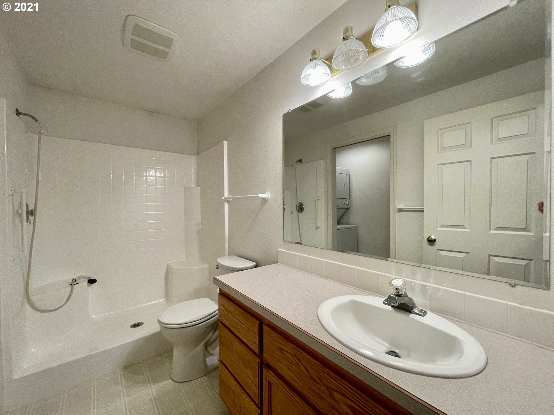 994 West L Street Springfield, OR 97477 - Photo 18 of 26 a bathroom with a sink a toilet and shower