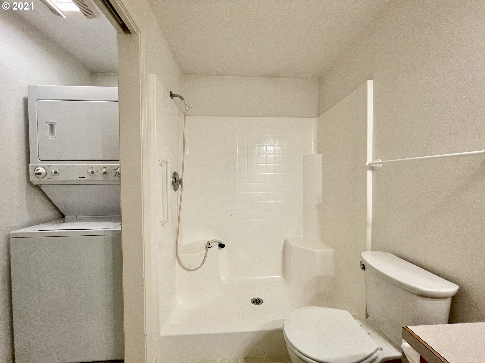 994 West L Street Springfield, OR 97477 - Photo 19 of 26 a white toilet sitting next to a bathroom sink
